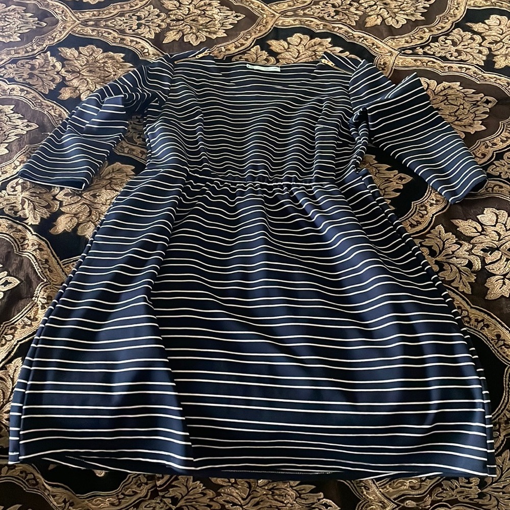 Blue and white stripped Maurice’s dress